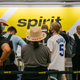 Stranded passengers at George Bush Intercontinental Airport try to find a new way home.